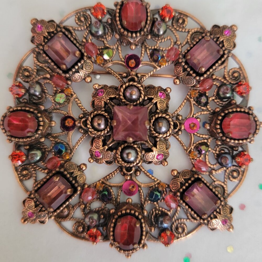 SATELLITE PARIS VINTAGE AMETHYST FACETED GLASS ON DETAILED COPPER BROOCH